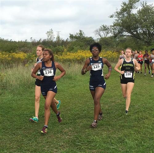 Crystana Vega-Allen & Delois Ivery compete at the Illiana Christian Invite