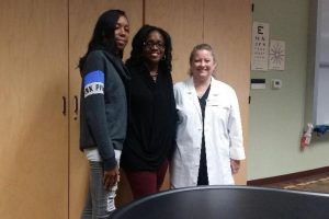 Former Hillcrest student Jasmine Foster, Brenetta Allison and Dr. Weber at National Health Sciences.