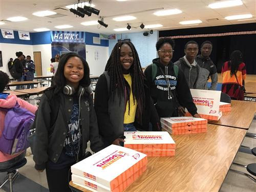 Hillcrest BPA students preparing to sell their donuts: (L to R) Tia Pollard, Alleya Arzu, Delois Ivery, Pierre Tutson, and Raqeeb Yarrow.