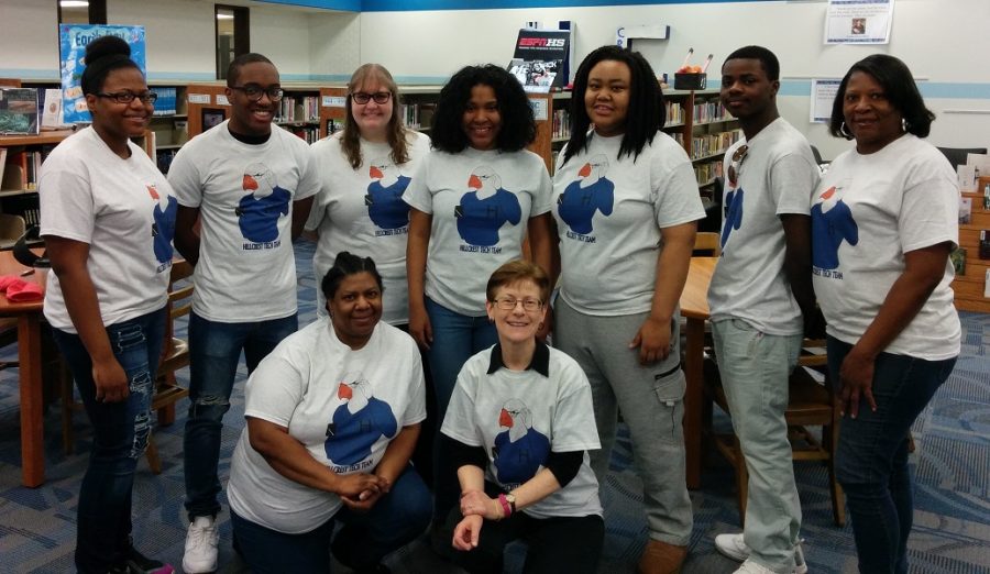 Hillcrests Tech Team ready to help! (Standing Left to Right:  Ashley Moore, Dylan Jernigan, Ms. K. Williams, Kya Vega-Allen, Nia Ricks, Fidel Field, and Ms. S. Maxwell.  Sitting Left to Right: Ms. H. Smith and Mrs. L. Walsh.)