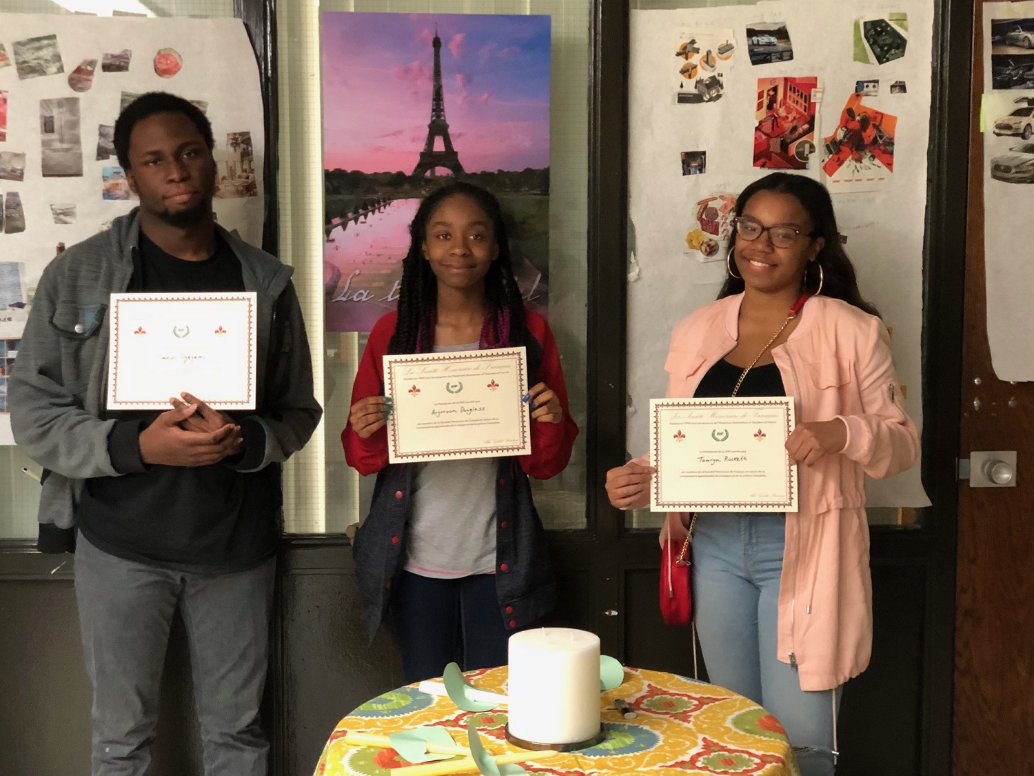 Hillcrest seniors Timeon Oyeyemi, Aryrreon Douglass, and Tamryn Rockett are inducted into the National French Language Honor Society.
